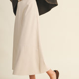 ONLINE EXCLUSIVE:  A DOSE OF CHARM IVORY BELTED FAUX LEATHER SKIRT
