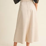 ONLINE EXCLUSIVE:  A DOSE OF CHARM IVORY BELTED FAUX LEATHER SKIRT