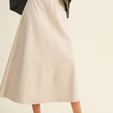 ONLINE EXCLUSIVE:  A DOSE OF CHARM IVORY BELTED FAUX LEATHER SKIRT