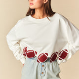 GAME FACE FOOTBALL PATCH CROPPED SWEATSHIRT