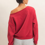 SEEING RED OFF THE SHOULDER SWEATSHIRT