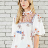 PICK OF THE BUNCH FLORAL TASSEL TOP