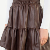 A LITTLE BIT FLIRTY TIERED FAUX LEATHER SKIRT