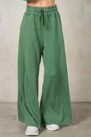 A MATTER OF COMFORT GREEN OVERSIZED SWEATPANTS