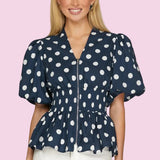 TAKE IN THE SIGHTS NAVY ZIP FRONT POLKA DOT BLOUSE