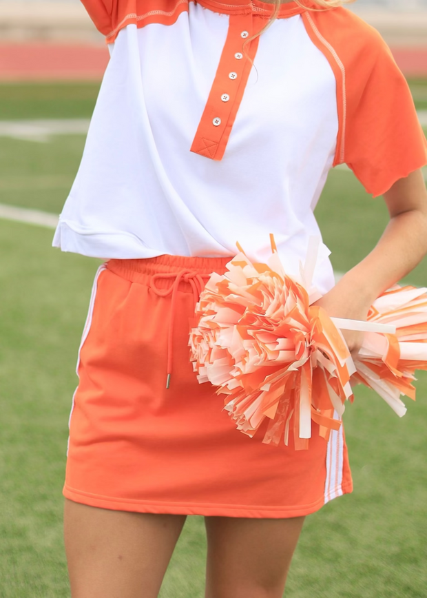 IT'S A TOUCHDOWN ORANGE AND WHITE HENLEY TEE