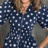 TAKE IN THE SIGHTS NAVY ZIP FRONT POLKA DOT BLOUSE