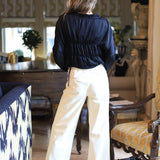 COSMOS WITH THE GIRLS BLACK RUFFLE BLOUSE