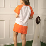 IT'S A TOUCHDOWN ORANGE AND WHITE GAME DAY SKORT