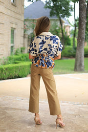 PLOT TWIST PLEATED BOTANICAL BLOUSE