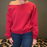 SEEING RED OFF THE SHOULDER SWEATSHIRT