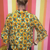 NOTHING BUT GOOD VIBES GEOMETRIC BLOUSE