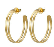 SHEILA FAJL:  LARGE GOLD ECLIPSE HOOPS