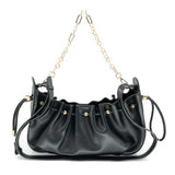 SADDLE SHOULDER BAG - BLACK PATENT OR TAN SUEDE
