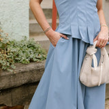 THE LENA PLEATED FLARE STRAPLESS MIDI DRESS