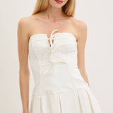 DOWNTOWN CHIC WHITE STRAPLESS PLEATED DRESS