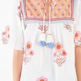 PICK OF THE BUNCH FLORAL TASSEL TOP