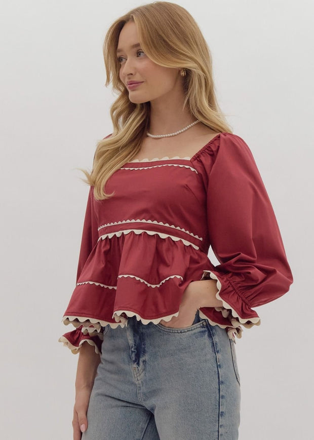 GAME ON BURGUNDY PEPLUM HEM TOP