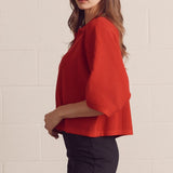 WORTH TALKING ABOUT RED SWEATER TOP