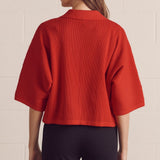 WORTH TALKING ABOUT RED SWEATER TOP